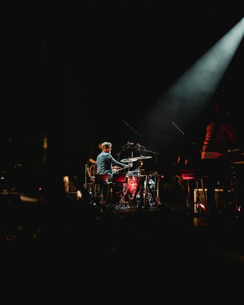 Drummer performing on stage